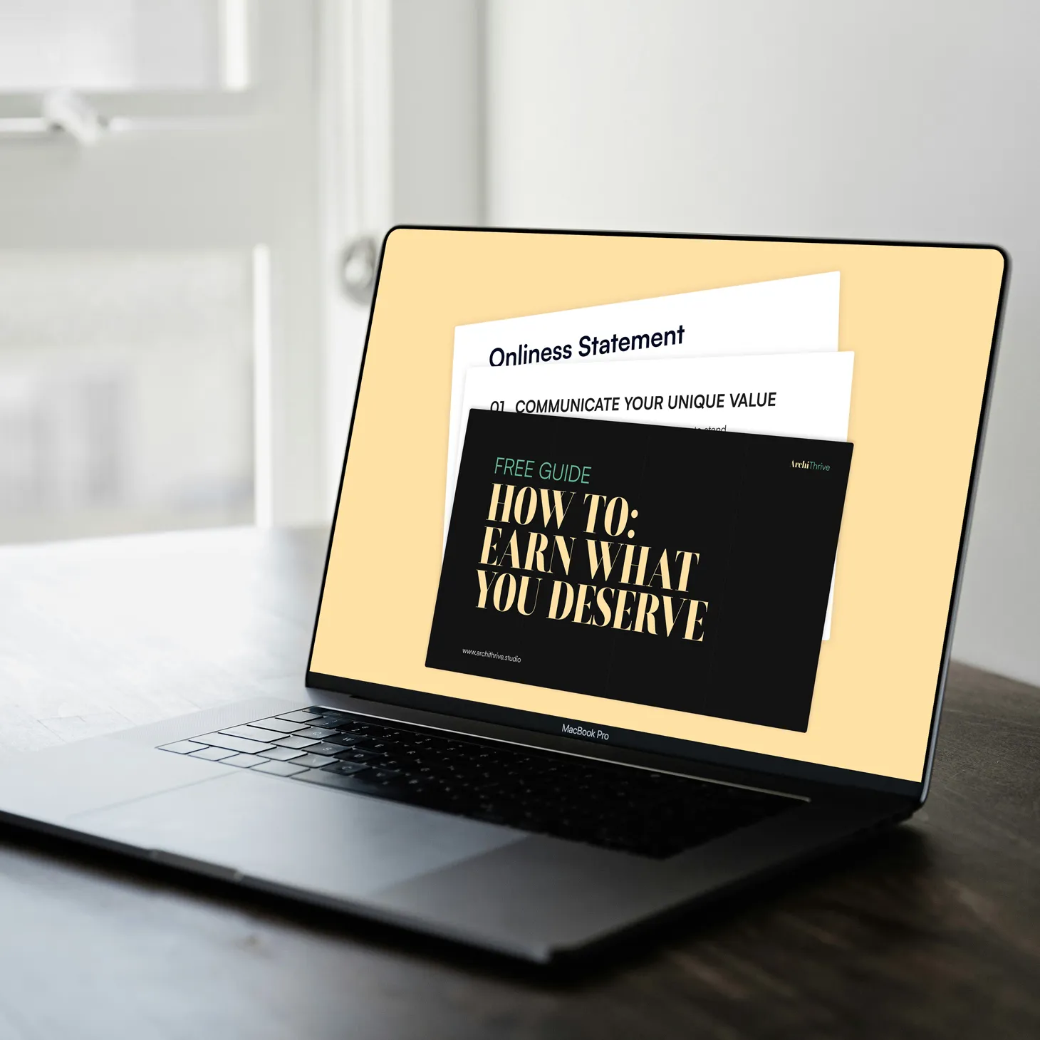 a laptop that shows an image of a free guide